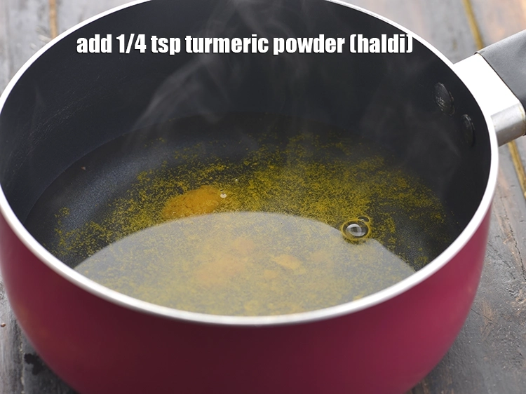 Step 3 – <p>Let the water boil for 2-3 minutes, further add <span style="background-color:rgb(255,255,255);color:rgb(0,0,0);">1/4 tsp </span><a href="https://www.tarladalal.com/glossary-turmeric-powder-haldi-645i"><u>turmeric powder …