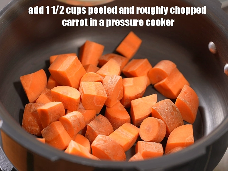 Step 13 – <p>For making carrot potato mixture, add 1 1/2 cups&nbsp;peeled and roughly&nbsp;<a href="https://www.tarladalal.com/glossary-chopped-carrot-798i">chopped carrot</a>&nbsp;in a pressure …