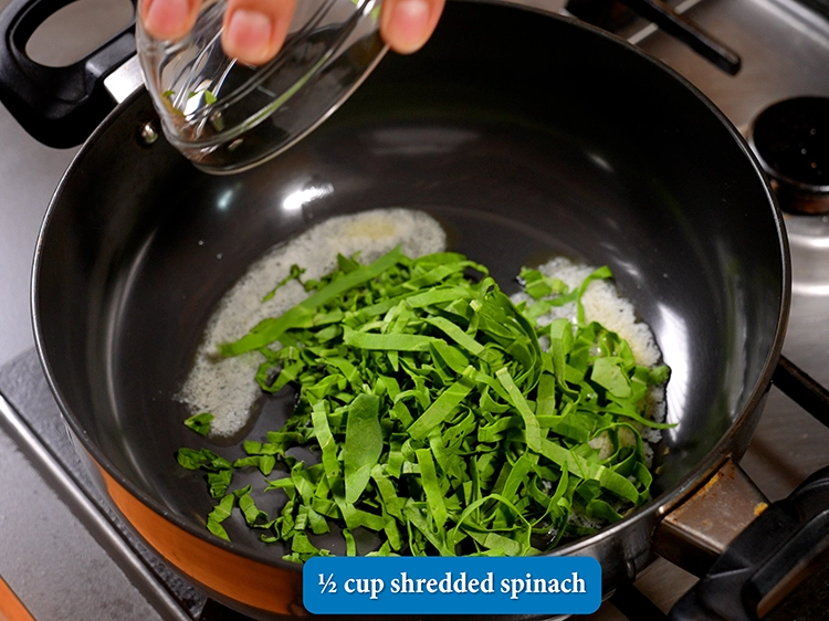 Step 23 – <p>Add 1/2 cup&nbsp;<a href="https://www.tarladalal.com/glossary-shredded-spinach-777i">shredded spinach (palak)</a>.&nbsp; <a href="https://www.tarladalal.com/recipes-using-spinach-255">Spinach</a>&nbsp;is one of the richest plant sources of&nbsp;<a …