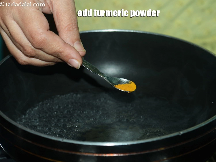 Step 24 – <p>Add turmeric powder.</p>