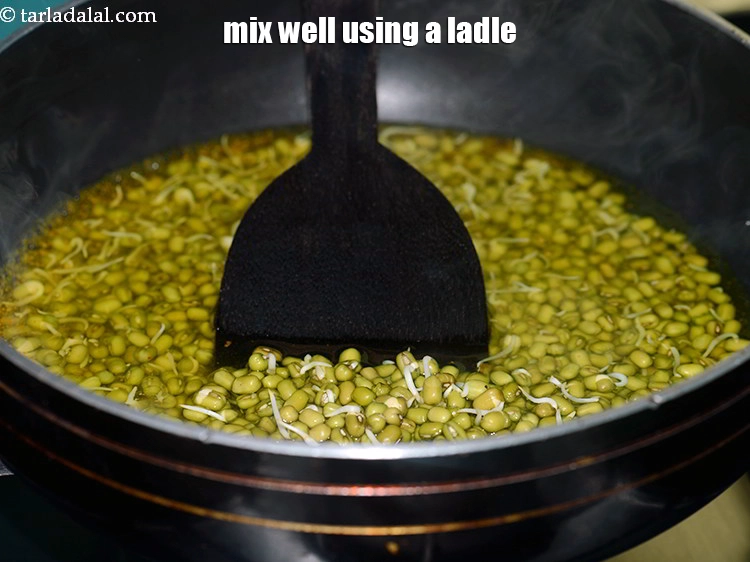 Step 26 – <p>Mix well using a ladle.</p>