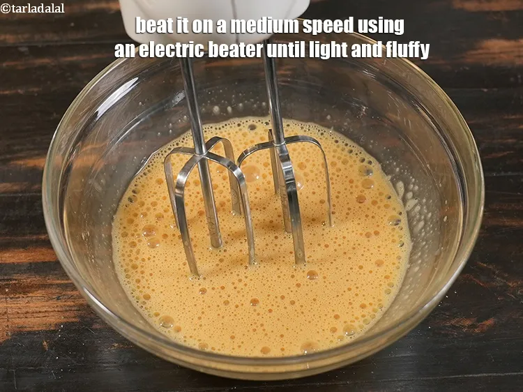 Step 12 – <p>Beat it on a medium speed using an electric beater until light and fluffy.</p>