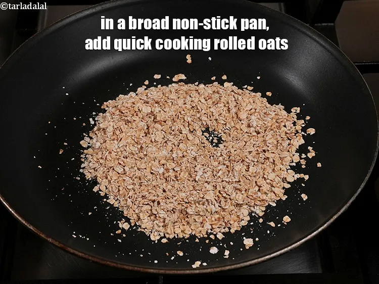 Step 12 – <p>In a broad non-stick pan, add ½ cup <a href="https://www.tarladalal.com/glossary-quick-cooking-rolled-oats-rolled-oats-547i">quick cooking rolled oats</a>.&nbsp;</p>