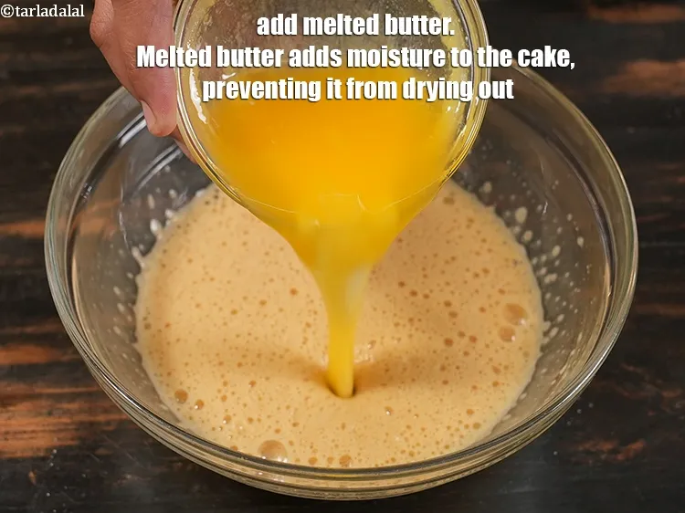 Step 13 – <p>Add ½ cup <a href="https://www.tarladalal.com/glossary-melted-butter-1941i">melted butter</a>. Melted butter adds moisture to the cake, preventing it …