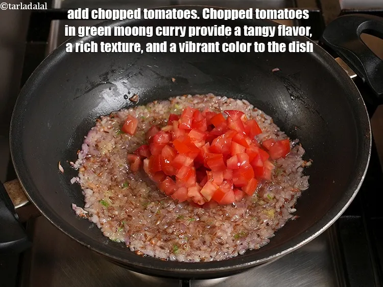 Step 18 – <p>Add ½ cup chopped tomatoes. Chopped tomatoes in green moong curry provide a tangy flavor, …
