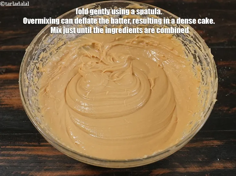 Step 18 – <p>Fold gently using a spatula. Overmixing can deflate the batter, resulting in a dense cake. …