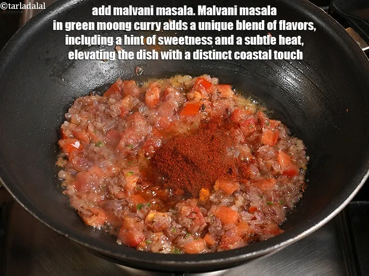 Step 21 – <p>Add 1 tbsp malvani masala. Malvani masala in green moong curry adds a unique blend …
