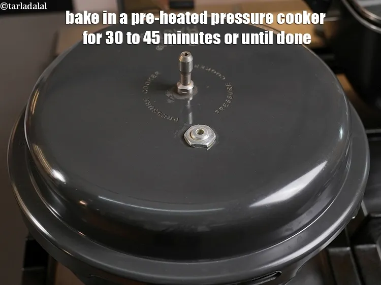 Step 21 – <p>Bake in a pre-heated pressure cooker for 30 to 45 minutes or until done.</p>