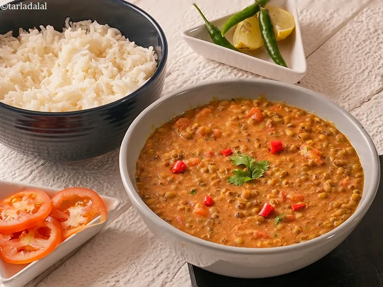 Step 33 – <p>A comforting and wholesome<strong> green moong curry</strong> made with whole green moong dal, tempered with …