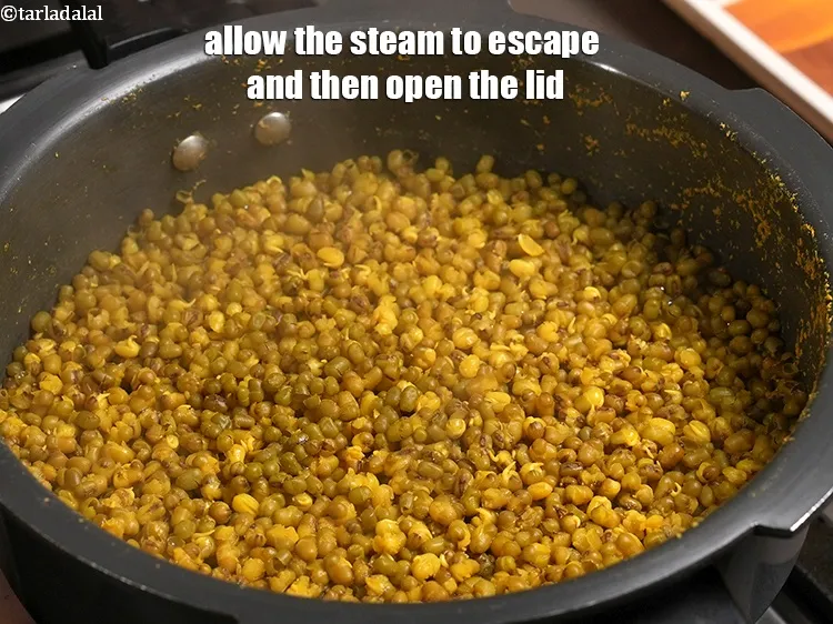 Step 8 – <p>Allow the steam to escape and then open the lid.</p>