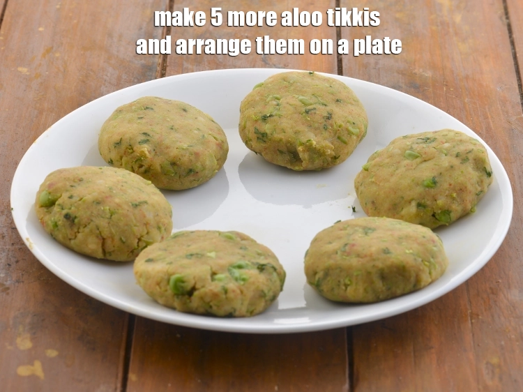 Step 12 – <p>Make 5 more&nbsp;<strong>aloo tikkis</strong>&nbsp;and arrange them on a plate.</p>