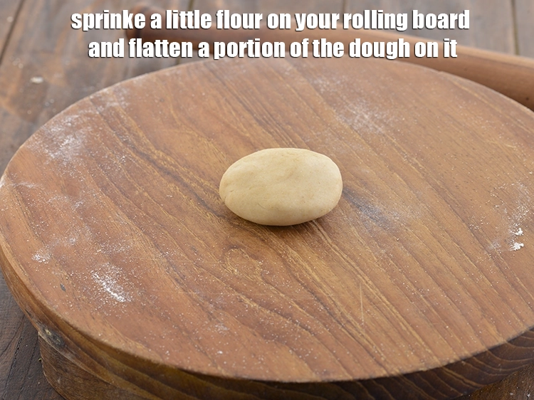 Step 10 – <p>Sprinke a little flour on your rolling board and flatten a portion of the dough …