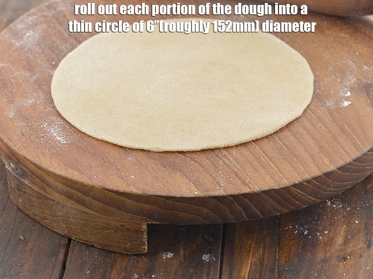Step 11 – <p>Roll out each portion of the dough into a thin circle of 6”(roughly 152mm) diameter. …