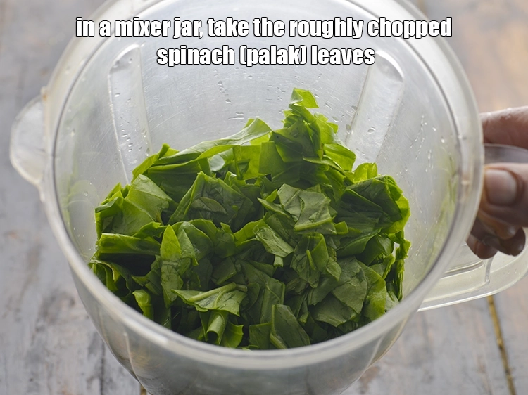 Step 9 – <p>In a mixer jar, take the <span style="background-color:rgb(255,255,255);color:rgb(0,0,0);">2 cups roughly </span><a href="https://www.tarladalal.com/glossary-spinach-palak-255i#ing_2362"><u>chopped spinach (palak) </u></a><span …