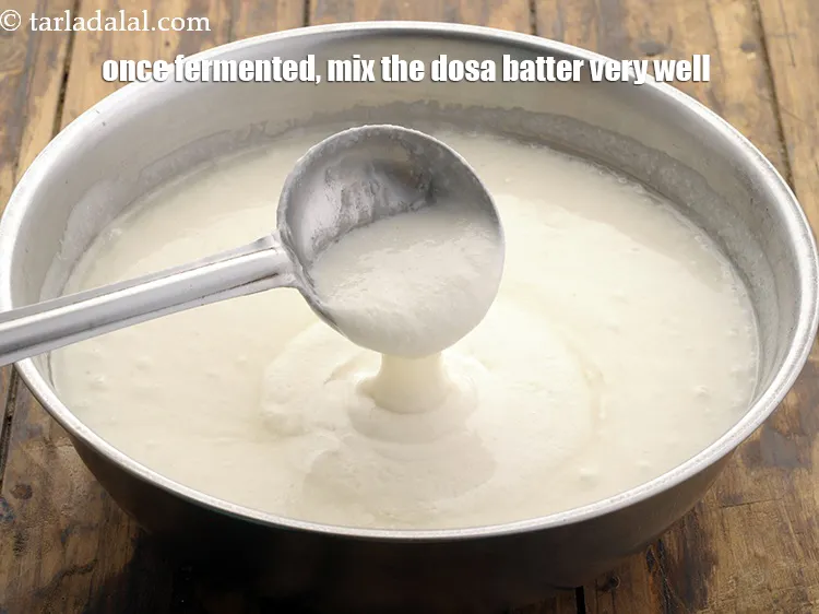Step 22 – <p>Once fermented, mix the <strong>dosa batter</strong> very well.</p>