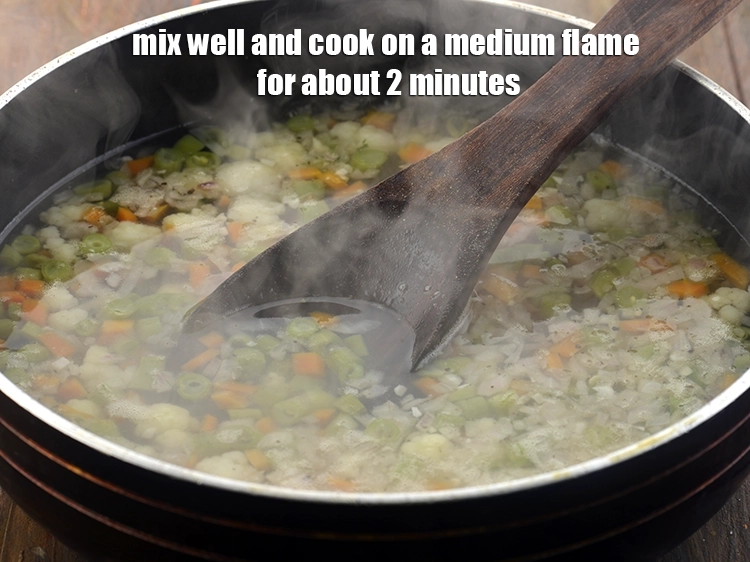 Step 10 – <p><span style="background-color:rgb(255,255,255);color:rgb(0,0,0);">Mix well and cook on a medium flame for about 2 minutes. Stir the …