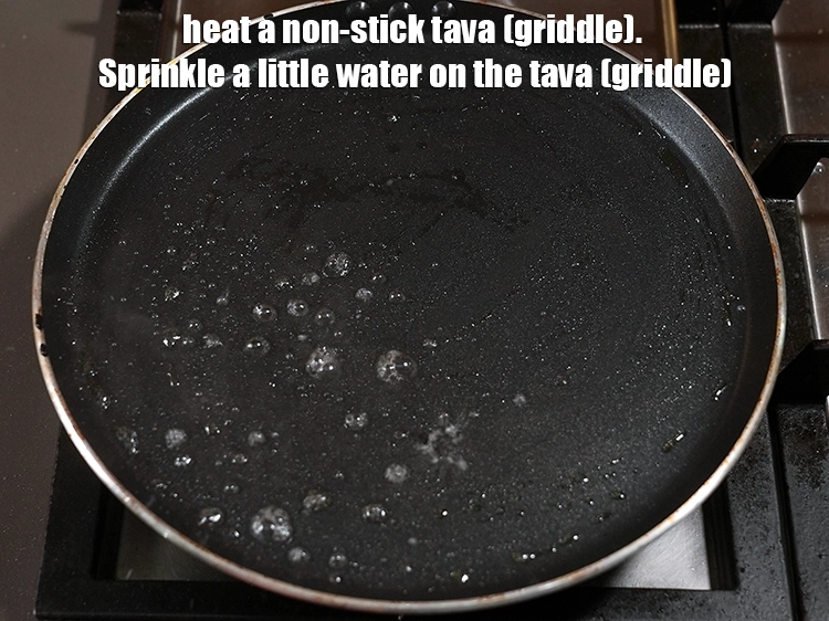 Step 14 – <p>For making the <strong>quinoa</strong> <strong>dosa recipe |&nbsp;</strong> heat a non-stick tava (griddle). Sprinkle a little …