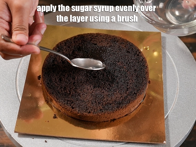 Step 16 – <p>Apply the sugar syrup evenly over the layer using a brush.</p>