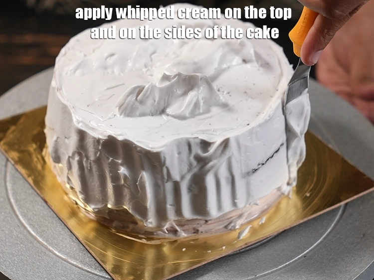 Step 31 – <p>Apply whipped cream on the top and on the sides of the cake.</p>