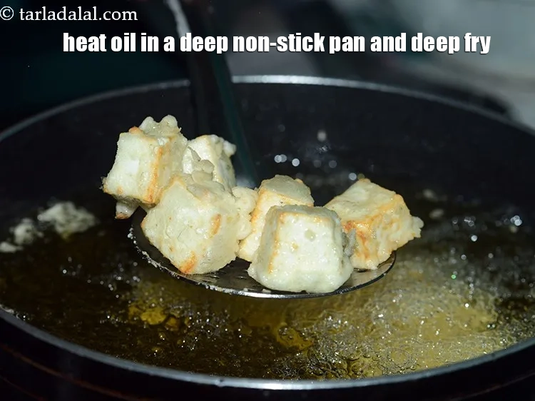 Step 9 – <p>Further, heat oil in a deep non-stick pan and deep fry the paneer slices till …