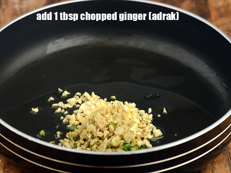 Step 13 – <p>Add <span style="background-color:rgb(255,255,255);color:rgb(0,0,0);">1 tbsp </span><a href="https://www.tarladalal.com/glossary-ginger-adrak-453i#ing_2366"><u>chopped ginger (adrak)</u></a>. Other veggies like finely chopped onion, capsicum …