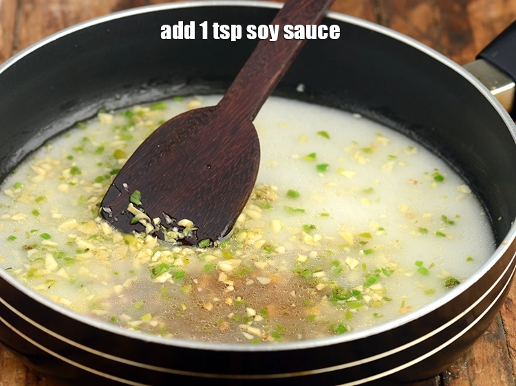 Step 16 – <p>Add <span style="background-color:rgb(255,255,255);color:rgb(0,0,0);">1 tsp </span><a href="https://www.tarladalal.com/glossary-soy-sauce-soya-sauce-864i"><u>soy sauce</u></a>. We have used regular soy sauce but, you …