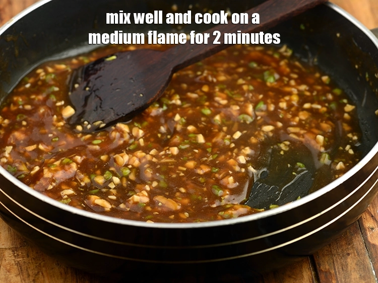 Step 20 – <p>Mix well and cook on a medium flame for 2 minutes, while stirring continuously.</p>