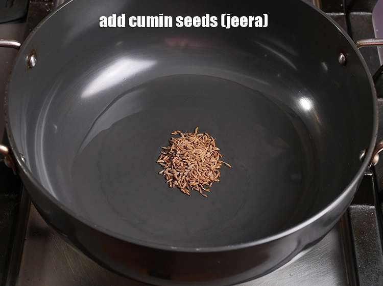 Step 11 – <p><span style="background-color:rgb(255,255,255);color:rgb(0,0,0);">Add the 1 tsp </span><a href="https://www.tarladalal.com/glossary-cumin-seeds-jeera-zeera-381i"><u>cumin seeds (jeera)</u></a><u>.</u></p>