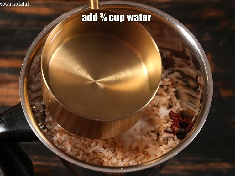 Step 16 – <p><span style="color:rgb(0,0,0);">Add ¾ cup water to the&nbsp;</span><strong>Fried Coconut Chutney mixture</strong></p>