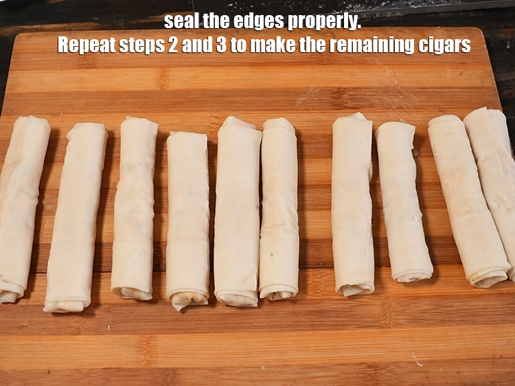Step 23 – <p>Seal the edges properly. Repeat steps 2 and 3 to make the remaining cigars.</p>