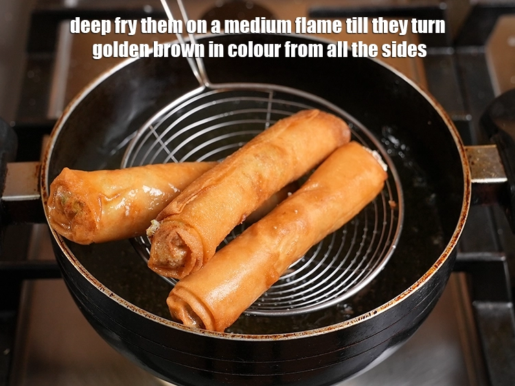 Step 25 – <p>Deep fry them on a medium flame till they turn golden brown in colour from …