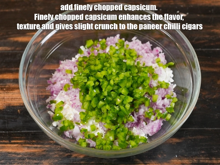 Step 5 – <p>Add ½ cup finely chopped capsicum. Finely chopped capsicum enhances the flavor, texture and gives …