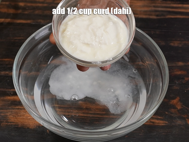 Step 8 – <p>Add <span style="background-color:rgb(255,255,255);color:rgb(0,0,0);">1/2 cup </span><a href="https://www.tarladalal.com/glossary-curd-dahi-yogurt-yoghurt-383i"><u>curd (dahi)</u></a><u>.</u></p>