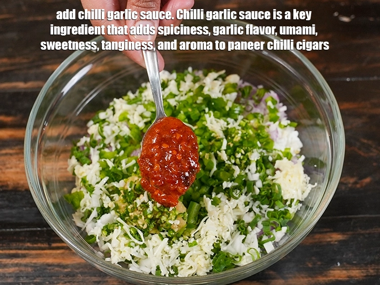 Step 10 – <p>Add 2 tbsp chilli garlic sauce. Chilli garlic sauce is a key ingredient that adds …