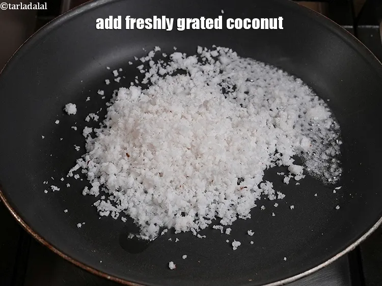Step 10 – <p>Add the <span style="background-color:rgb(255,255,255);color:rgb(0,0,0);">1 cup freshly </span><a href="https://www.tarladalal.com/glossary-coconut-nariyal-269i#ing_3229"><u>grated coconut</u></a>. We are using freshly grated coconut …