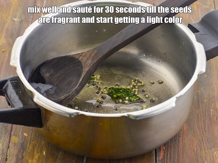 Step 13 – <p><span style="background-color:rgb(255,255,255);color:rgb(0,0,0);">Mix well and sauté for 30 seconds till the seeds are fragrant and start …