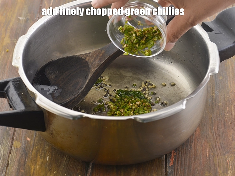 Step 14 – <p><span style="background-color:rgb(255,255,255);color:rgb(0,0,0);">Now add the 2 tsp finely </span><a href="https://www.tarladalal.com/glossary-green-chillies-hari-mirch-331i#ing_2388"><u>chopped green chillies</u></a><span style="background-color:rgb(255,255,255);color:rgb(0,0,0);"> for a spicy …
