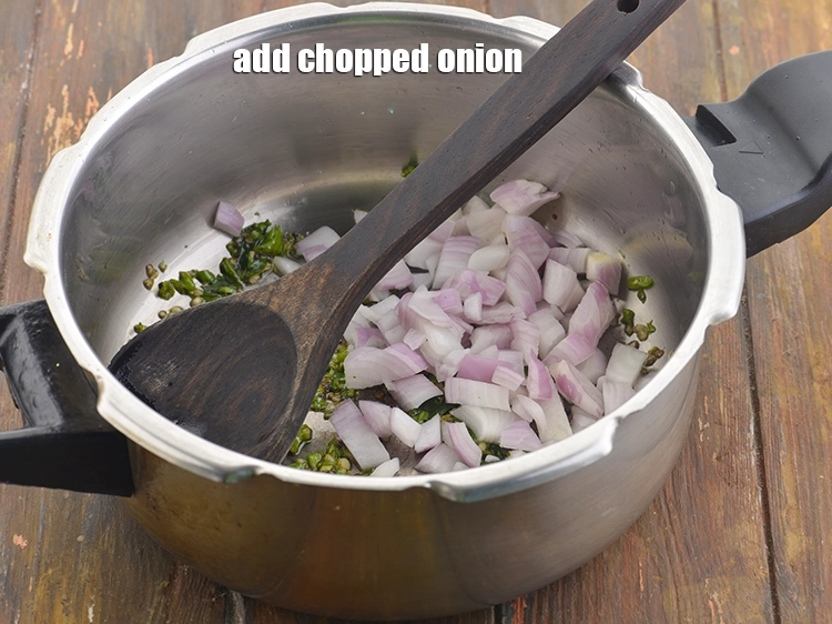 Step 16 – <p><span style="background-color:rgb(255,255,255);color:rgb(0,0,0);">Now add the 1/2 cup </span><a href="https://www.tarladalal.com/glossary-onions-pyaz-pyaaz-kanda-548i#ing_2327"><u>chopped onion</u></a><span style="background-color:rgb(255,255,255);color:rgb(0,0,0);"> to this. They will add …