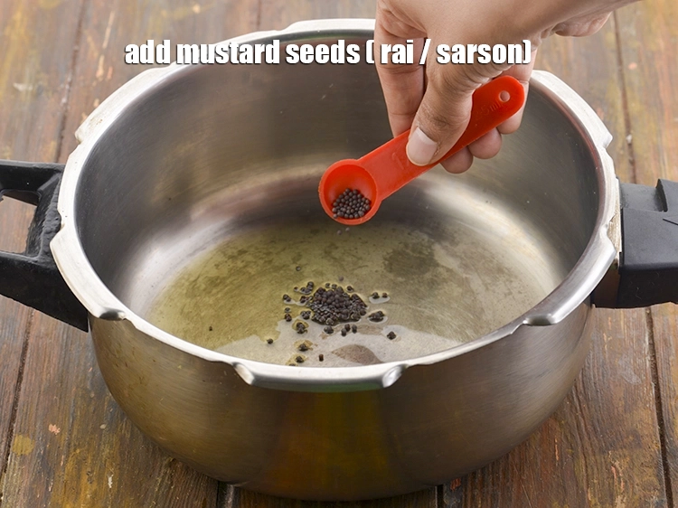 Step 10 – <p><span style="background-color:rgb(255,255,255);color:rgb(0,0,0);">Add the 1/4 tsp </span><a href="https://www.tarladalal.com/glossary-mustard-seeds-sarson-rai-sarson-ke-beej-525i"><u>mustard seeds ( rai / sarson)</u></a><span style="background-color:rgb(255,255,255);color:rgb(0,0,0);">. No, Upma …