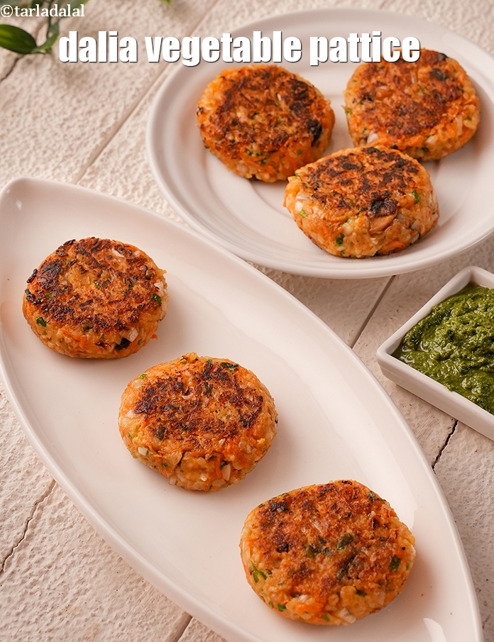 Step 57 – <p>Serve&nbsp;<strong>broken wheat and paneer patties</strong> hot with green chutney.</p>