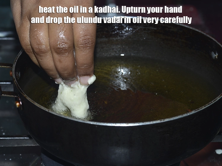 Step 25 – <p>For frying the <strong>South-Indian medu vada</strong>, heat the oil in a kadhai. Upturn your hand …