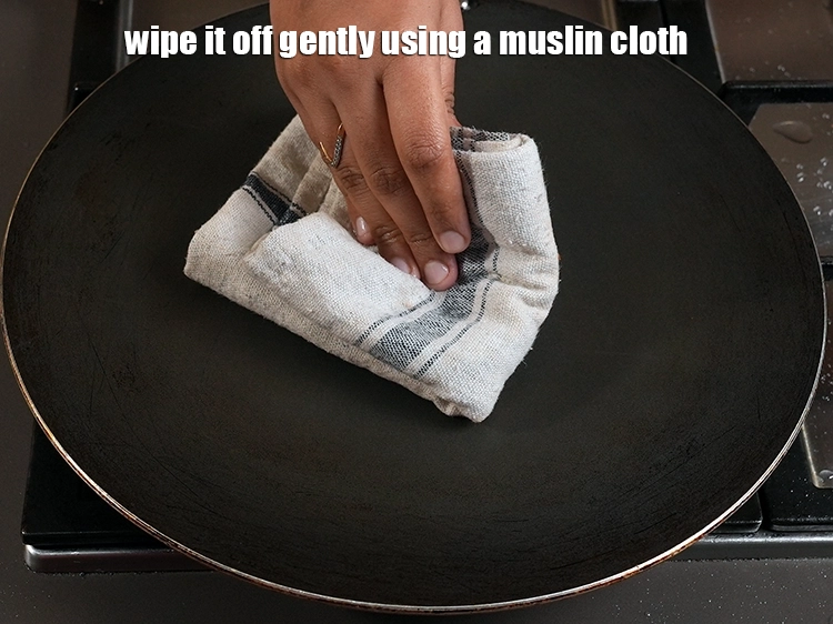 Step 21 – <p>Take a non-stick tava (griddle) and grease it lightly using ghee. Let it get heated …