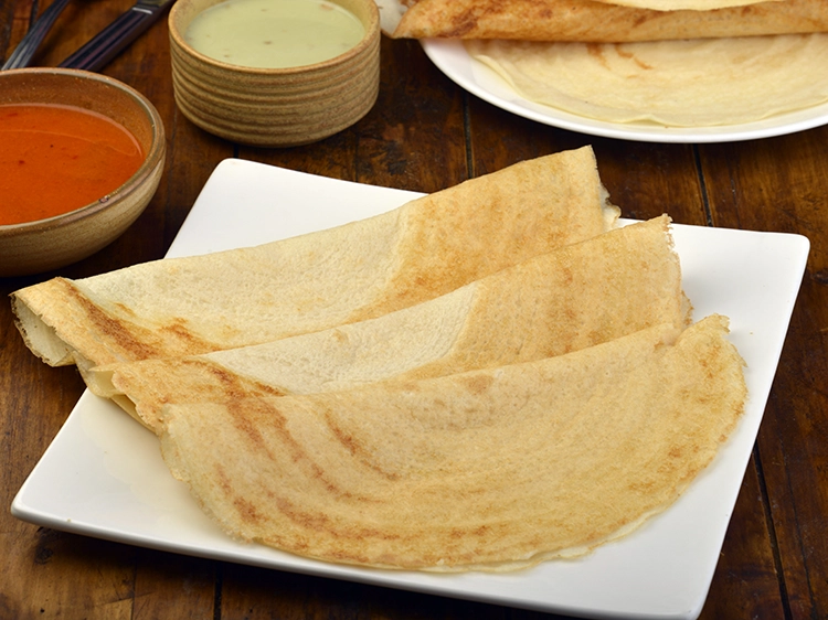 Step 18 – <p>Repeat with the remaining batter to make 9 more <strong>Crispy Paper Dosas</strong>.</p>