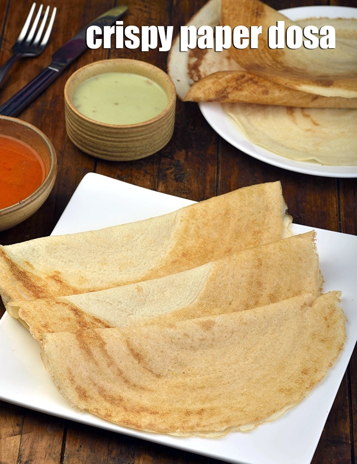 Step 24 – <p><span style="background-color:rgb(255,255,255);color:rgb(0,0,0);">Serve&nbsp;</span><strong>Crispy Paper Dosa</strong><span style="background-color:rgb(255,255,255);color:rgb(0,0,0);">&nbsp;immediately with </span><a href="https://www.tarladalal.com/Sambhar-3578r"><u>sambhar</u></a><span style="background-color:rgb(255,255,255);color:rgb(0,0,0);"> and</span><a href="https://www.tarladalal.com/Coconut-Chutney-(-Desi-Khana)-1467r"><u> coconut chutney</u></a><u>.</u></p>