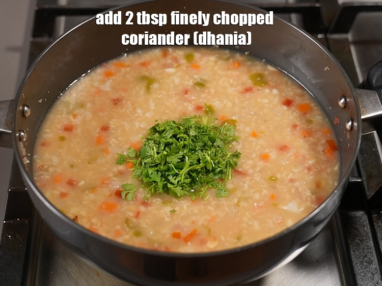 Step 29 – <html><head></head><body><p>Add&nbsp;2 tbsp&nbsp;finely&nbsp;<a href="glossary-chopped-coriander-783i">chopped coriander (dhania)</a>.</p></body></html>