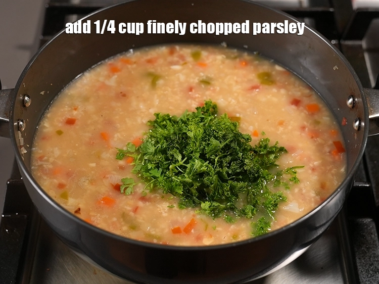Step 30 – <html><head></head><body><p>Add&nbsp;1/4 cup&nbsp;finely&nbsp;<a href="glossary-chopped-parsley-793i">chopped parsley</a>.&nbsp;&nbsp;Parsley&nbsp;is a fairly good source of&nbsp;<a href="https://www.tarladalal.com/recipes-for-Calcium-Rich-375">calcium</a>, which is definitely known to …