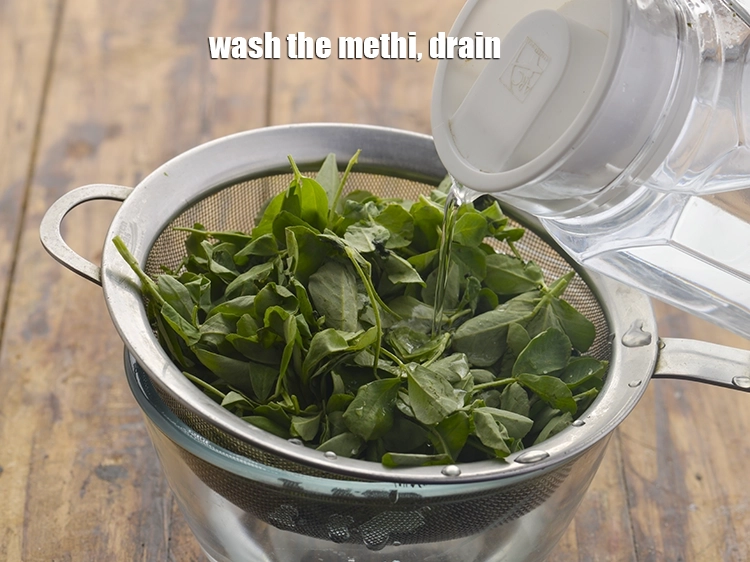 Step 3 – <p>Wash the methi, drain and place it on a chopping board. If you do not …