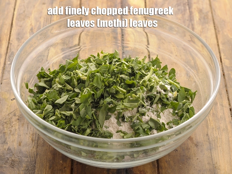 Step 6 – <p>Add the <span style="background-color:rgb(255,255,255);color:rgb(0,0,0);">1/2 cup finely </span><a href="https://www.tarladalal.com/glossary-fenugreek-leaves-methi-methi-leaves-methi-ke-patte-methi-ki-bhaji-373i#ing_2382"><u>chopped fenugreek leaves (methi) </u></a><span style="background-color:rgb(255,255,255);color:rgb(0,0,0);">leaves</span>.</p>