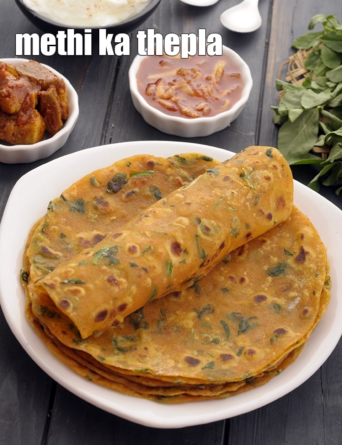 Step 27 – <p><span style="background-color:rgb(255,255,255);color:rgb(0,0,0);">Serve the </span><strong>methi thepla</strong><span style="background-color:rgb(255,255,255);color:rgb(0,0,0);"> hot with chunda or </span><a href="https://www.tarladalal.com/Quick-Mango-Chunda--Aam-ka-Chunda-Gujarati-Raw-Mango-Sweet-Pickle-3429r"><u>sweet mango pickle</u></a><span style="background-color:rgb(255,255,255);color:rgb(0,0,0);">. …