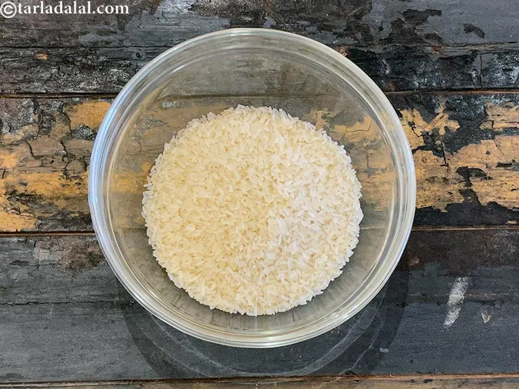 Step 2 – <p>Add the par-boiled rice to a deep bowl. You can make this with any short …